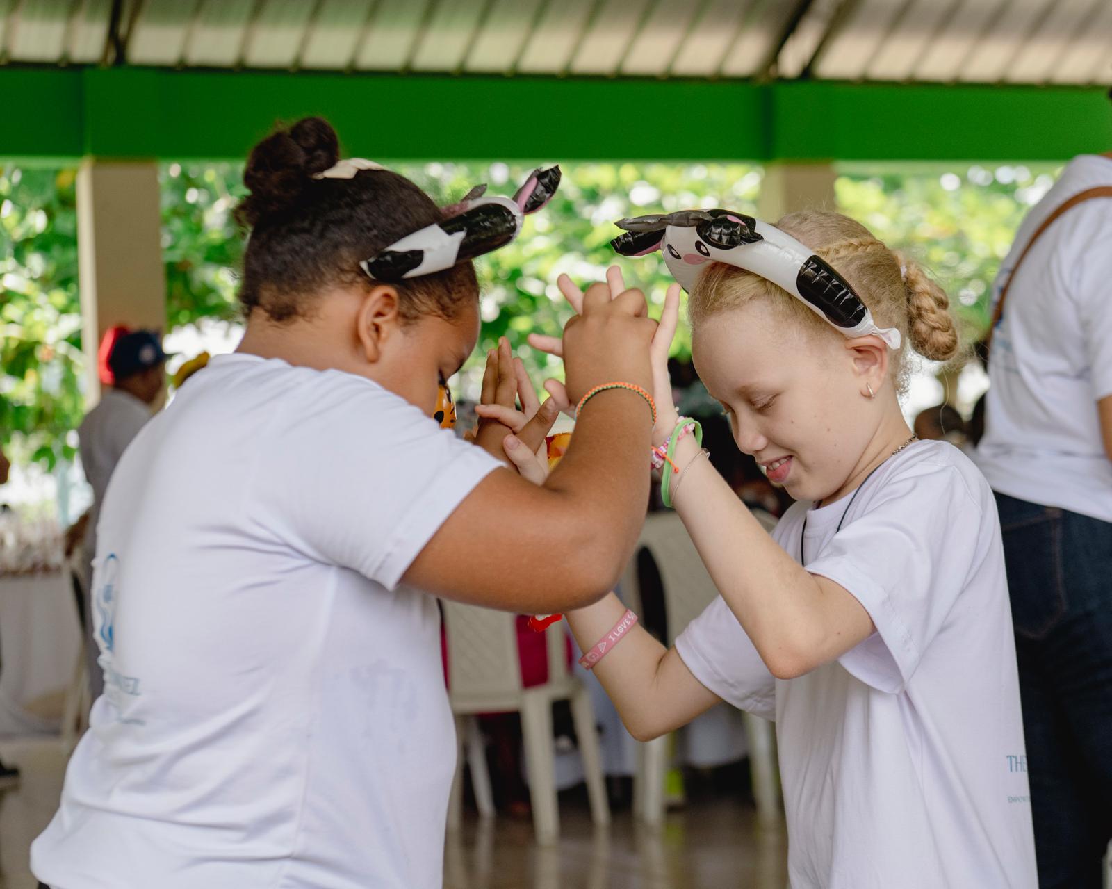 Children playing at a VelRod Charity community event