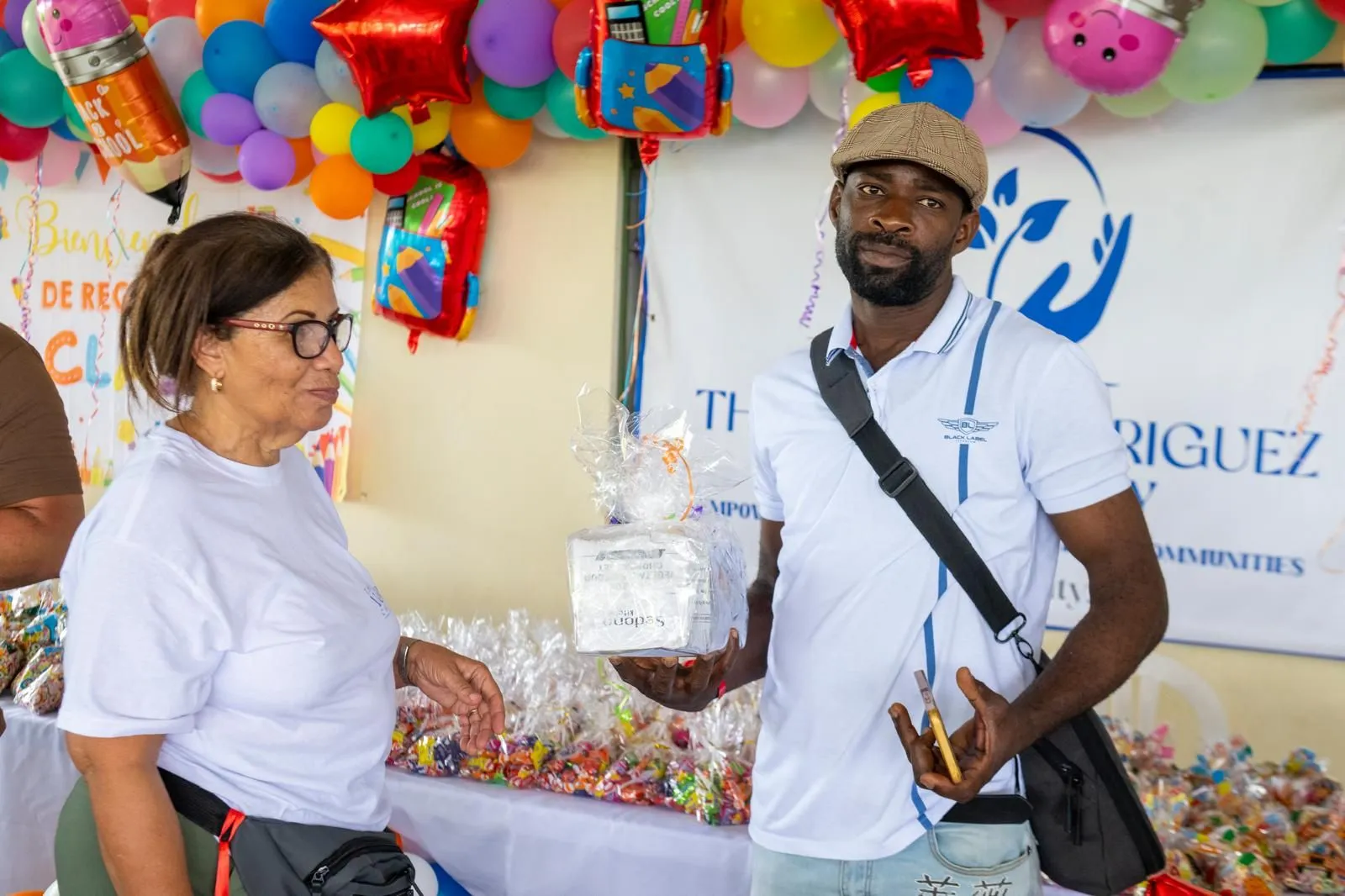 A father receiving a gift basket